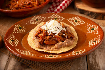 Ground beef tinga, a traditional Mexican home-cooked dish consisting primarily of beef cooked with chipotle chili and lots of onion, is traditionally eaten on 