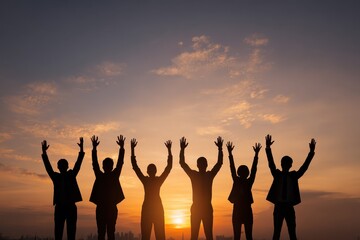 Group of joyful business team celebrating success with raised hands against sunset skyline in urban setting