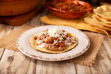 Ground beef tinga, a traditional Mexican home-cooked dish consisting primarily of beef cooked with chipotle chili and lots of onion, is traditionally eaten on 