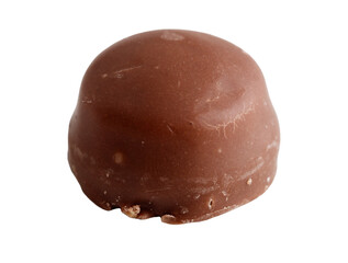 A chocolate covered candy is sitting on a white background
