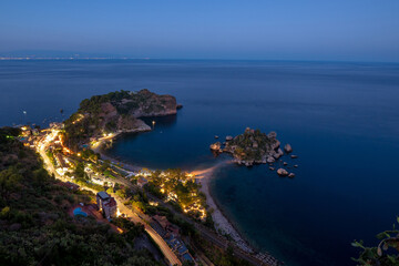 Night view of Isola Bella and the coast of Taormina