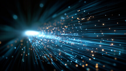 Fototapeta premium Digital Data Flow: An abstract display of shimmering, blue and gold lights exploding from a central source, visualizing the rapid flow of digital information and technological progress.