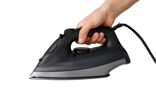 Main tenant un fer à repasser électrique moderne