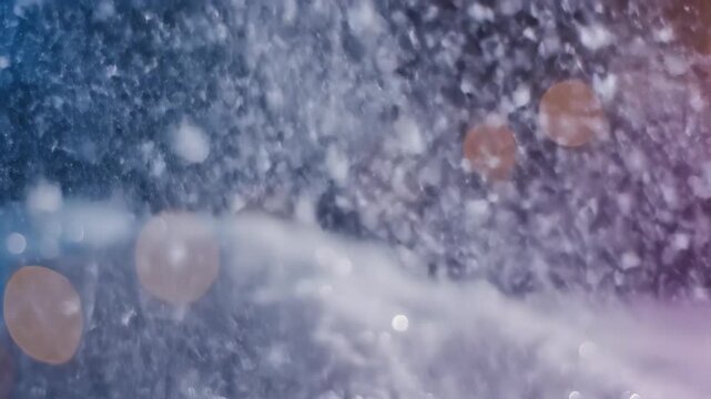 Mesmerizing Winter Landscape: Snowflakes Dancing in a Blue and Purple Hued Ambiance