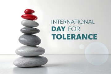 International Day for Tolerance. A stack of balanced stones with one red stone symbolizes diversity, inclusion, harmony, and the acceptance of difference.
 Generative Ai.