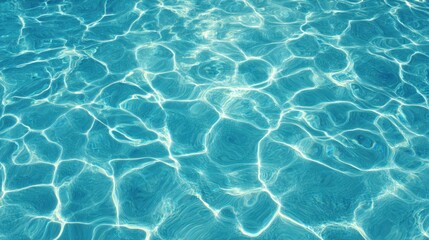 Rippling water glimmers under bright sunlight creating mesmerizing patterns and reflections.