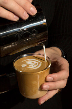 Barista making flat white coffee