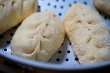 Pyanse, pigodi or Wangmandu steamed pie, dumpling stuffed with cabbage and meat