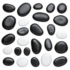 Smooth, dark and white rounded stones arranged on a black background