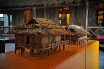 Display model represents a traditional house at the Vietnam Museum of Ethnology in Hanoi, Vietnam..