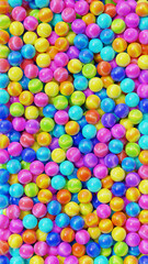 Vivid glass marbles texture. Colorful glossy spheres with light reflections. Abstract 8K background for design, wallpaper or print.