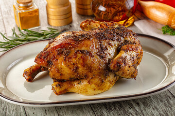 Baked in oven whole chicken with spices