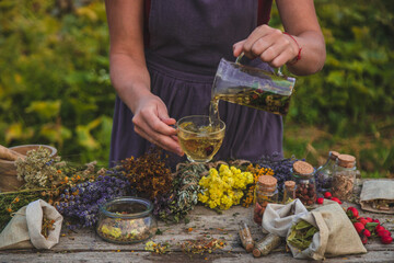 woman brews herbal tea. Selective focus.