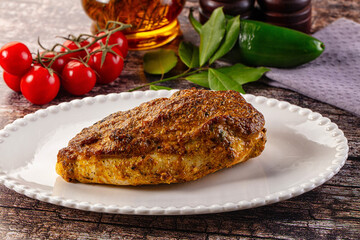 Baked chicken breast with spices and herbs