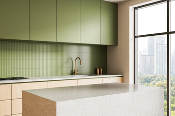 Modern kitchen interior with green cabinets, terrazzo island, and city skyline background through large window in minimal contemporary design style. 3D Rendering
