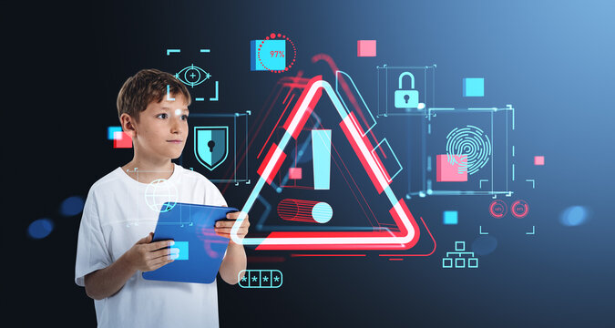 Boy holding tablet with digital warning icons representing onlin - Powered by Adobe
