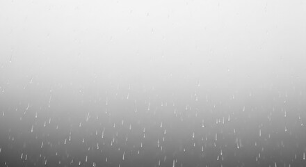 Gentle rain falling against a soft gray background, perfect for adding a calming, melancholic mood to your project or design with a clean, minimalist aesthetic