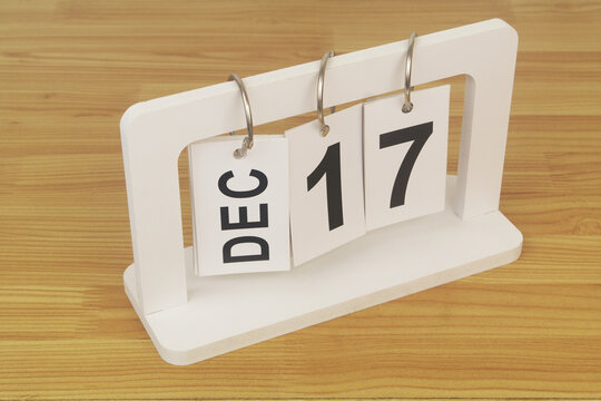 December, 17 on calendar on wooden table close-up. - Powered by Adobe