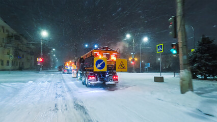 Clearing roads during a winter snowstorm © SGr