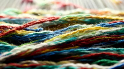 Colorful skeins of yarn stacked in soft light, tactile fibers and woven texture for craft backgrounds - Powered by Adobe