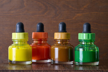 watercolor paint pot on wooden plank