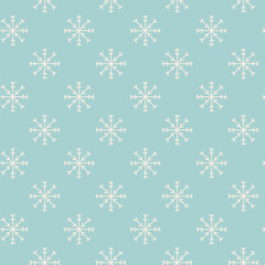 Winter seamless pattern of white snowflakes on light blue background. Doodle vector holiday illustration with hand drawn snow background.