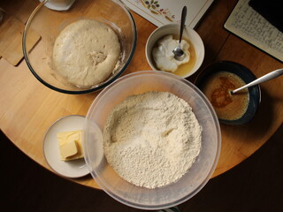 Fermented dough, butter, eggs, flour and yogurt ready to be mixed