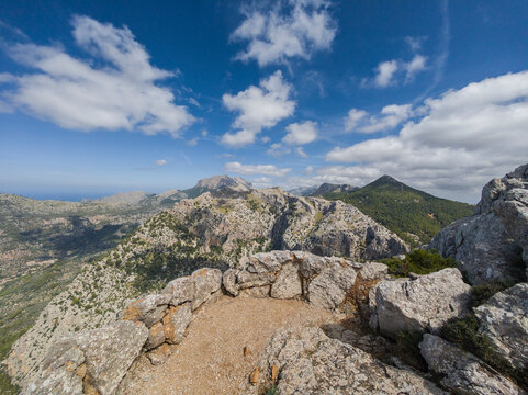 hikers on top of Es Cornador and the Xim Quesada Viewpoint, Natural area of the Serra de Tramuntana., Majorca, Balearic Islands, Spain
