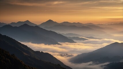 Misty Mountain Range at Sunrise: Layers of Peaks and Valley Fog
