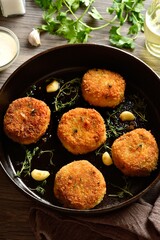 Fish cakes from mashed potato and minced cod fish