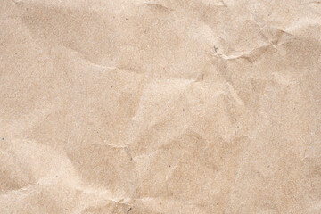 Abstract crumpled and creased recycle brown paper texture background