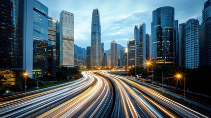 Fototapeta premium City skyline at twilight with glowing skyscrapers and light trails from moving vehicles
