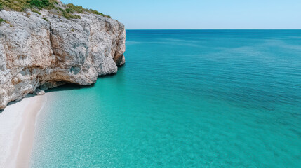 Obraz premium Turquoise sea meets rocky cliffs serene coastal landscape, inviting tranquility and exploration