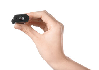 Fototapeta premium Woman with hidden spy camera on white background, closeup