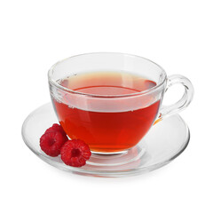 Cup of delicious tea and raspberries isolated on white