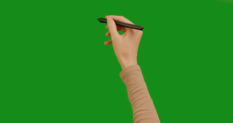 Woman hand drawing vertical and horizontal lines of pen on chroma key green screen background. Gestures Chroma Key pack, like using a touchscreen.