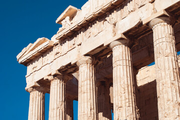 Parthenon without scaffolding. Details of Acropolis with Greek columns and marble ruins. Ancient...
