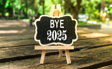 Bye 2025 Written on Chalkboard. Saying Goodbye to the 2025 Year and Welcome a Fresh Start in 2026. End of the Year Reflection