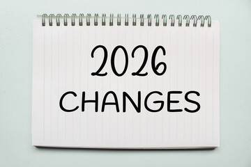 A notebook with the text “2026 Changes” written on the page. New Year Transformation, Growth, and Future Planning Concept