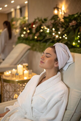 Young woman at spa with skincare and makeup, wellness concept