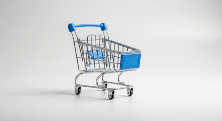 Empty metal shopping cart with blue accents, isolated on white