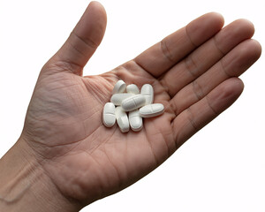 Person holding white oval pills in palm representing medication, health, and wellness for pharmaceutical or healthcare concepts.