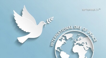 Papercut dove with olive branch flies over earth, for International Day of Peace