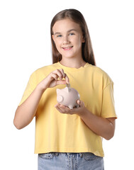 Girl putting her pocket money into piggy bank on white background