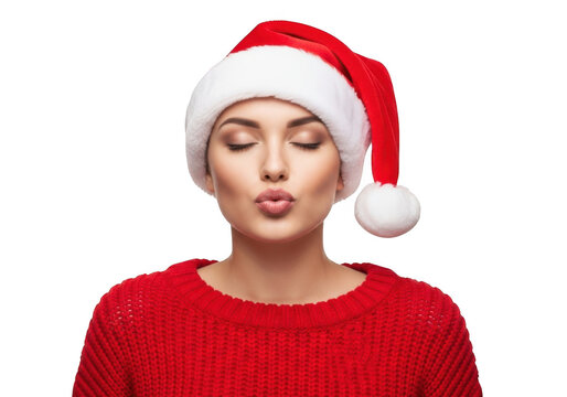 Beautiful woman in red sweater and santa hat isolated on transparent background sending an air kiss with closed eyes