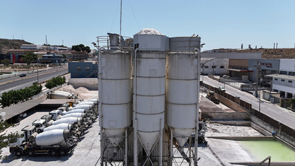 Aerial drone view of industrial cement plant and construction materials factory