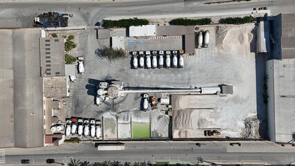 Aerial drone view of industrial cement plant and construction materials factory