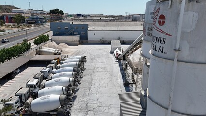 Aerial drone view of industrial cement plant and construction materials factory