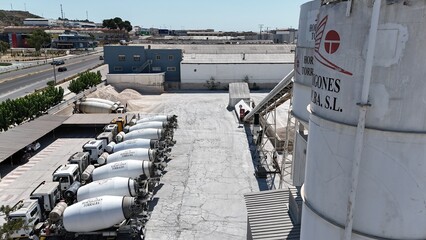 Aerial drone view of industrial cement plant and construction materials factory