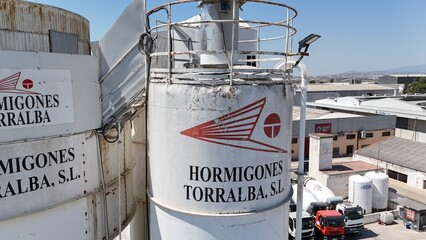 Aerial drone view of industrial cement plant and construction materials factory